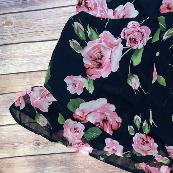 Black Floral Rose Halter Backless Romper with Ruffle Hem - Picture 4 of 7